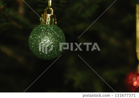 Beautiful Christmas defocused blurred background with Christmas tree lights in the evening. Festive New Year's mood, flash photography, retro modern style 131677371