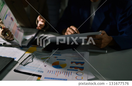 business people in meeting discussing plans together 131677576