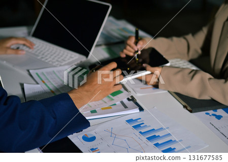 business people in meeting discussing plans together 131677585