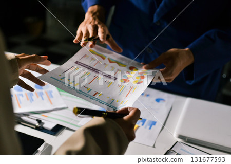 business people in meeting discussing plans together business people in meeting discussing plans together 131677593