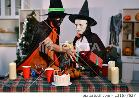 People having fun at Halloween party People having fun at Halloween party 131677627