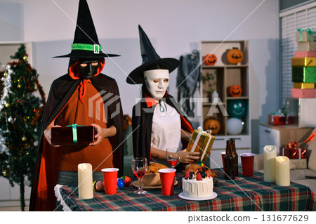 People having fun at Halloween party People having fun at Halloween party 131677629