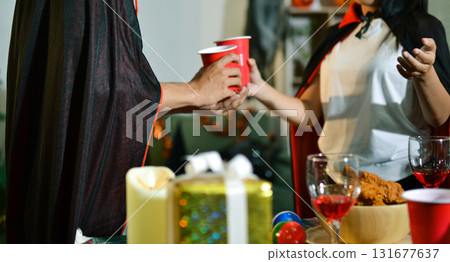 People having fun at Halloween party 131677637