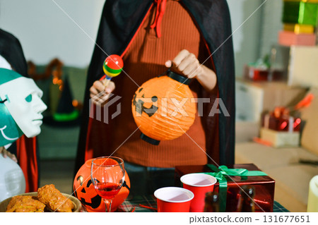 People having fun at Halloween party 131677651