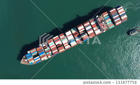 Cargo ship filled with containers in port area 131677758