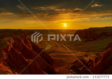 Bayanzag flaming cliffs at sunset in Mongolia Bayanzag flaming cliffs at sunset in Mongolia 131677773