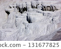 Natural white travertine terraces formed by mineral springs. Unique geological landscape and popular travel destination with surreal rock formations 131677825