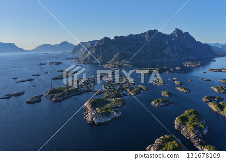 Lofoten islands landscape with fishing village and mountains 131678109