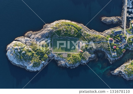 Henningsvaer village and football pitch in lofoten, norway 131678110