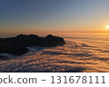 Sunrise glowing above mountain peaks and a sea of clouds, Switzerland 131678111