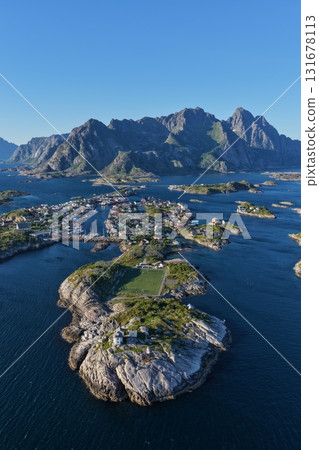 Henningsvaer village and football pitch in lofoten, norway 131678113