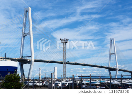 Under a blue sky, the view of the Meiko Chuo Bridge over the Nagoya Port train yard 131678208
