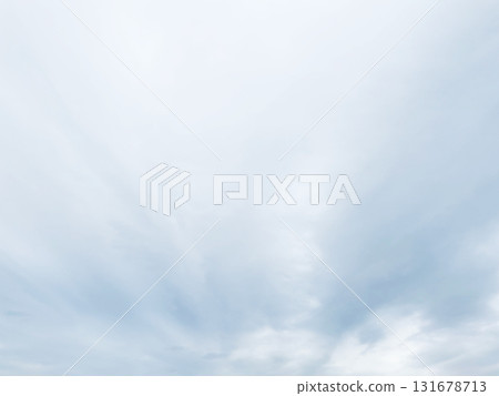 Background image of a white-gray cloudy sky with rain clouds Background image of a white-gray cloudy sky with rain clouds 131678713
