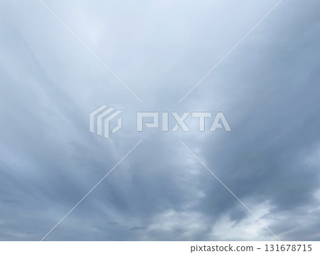 Background image of a gray cloudy sky with rain clouds Background image of a gray cloudy sky with rain clouds 131678715