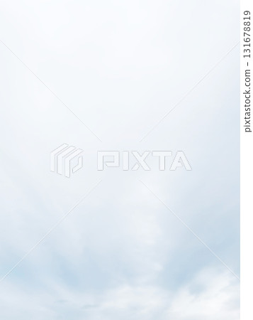 Vertical background image of a bright white-gray cloudy sky with rain clouds Vertical background image of a bright white-gray cloudy sky with rain clouds 131678819