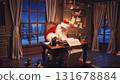 Santa is at home, sitting at his desk, working before Christmas. Santa's daily routine. Santa reads children's letters at his desk on Christmas Eve. 131678884