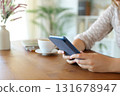Woman hands holding ebook reading digital book 131678947