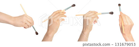 Set of human hands holding paintbrush isolated on transparent background 131679053