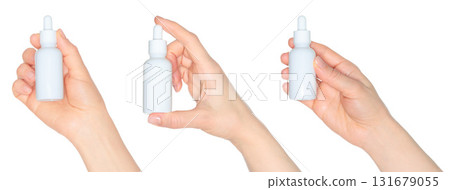 Set of human hands holding white cosmetic bottle isolated on transparent background Set of human hands holding white cosmetic bottle isolated on transparent background 131679055