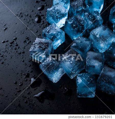 Crushed and Cubed Ice with Blue Highlights on Black Background in Top-Down Composition Crushed and Cubed Ice with Blue Highlights on Black Background in Top-Down Composition 131679201