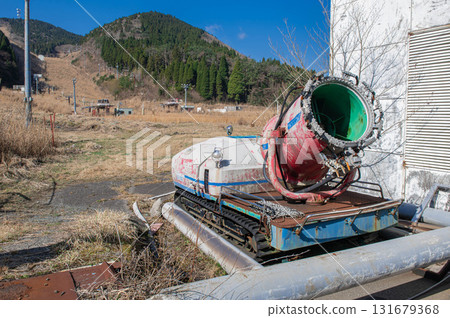 A closed ski resort covered in grass 131679368