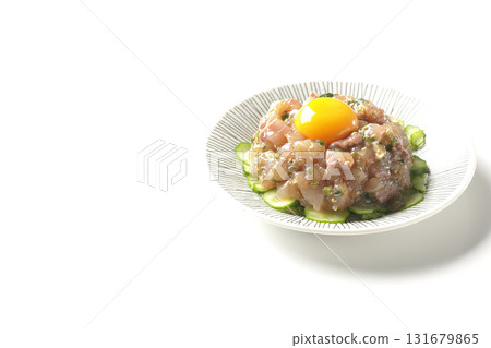 Spanish mackerel tartare photographed on a white background 131679865