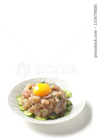 Spanish mackerel tartare photographed on a white background 131679880