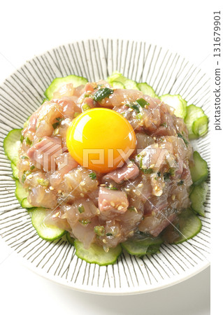 Spanish mackerel tartare photographed on a white background Spanish mackerel tartare photographed on a white background 131679901