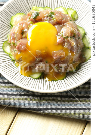 Crack the egg yolk on top of the Spanish mackerel yukke 131680042