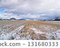 A rural area where the snow has melted a little 131680333