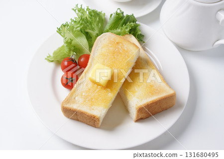 Buttered toast for breakfast 131680495