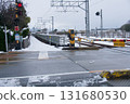 A train arriving in the snow 131680530