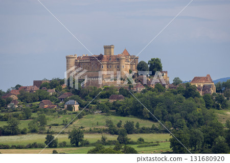 Castelnau Bressac castle standing on a hill in Occitanie, France 131680920