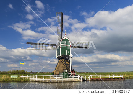 Windmill in Groot Ammers, South Holland with Ukrainian flag 131680937