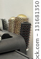 Hairbrushes organized in a holder, featuring various brush types, suitable for hairstyling background 131681350