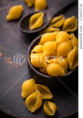 Raw pasta in shape of shells Raw pasta in shape of shells 131681716