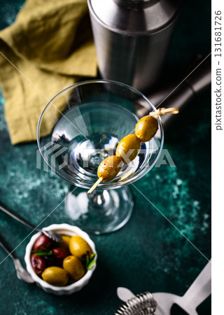 Traditional martini cocktail with olives and Traditional martini cocktail with olives and 131681726