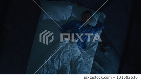 Man Suffers From Insomnia and Obsessive Thoughts Man Suffers From Insomnia and Obsessive Thoughts 131682636