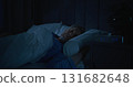 Tired From Insomnia, Man Tries Fall Asleep in Early Hours of Morning 131682648