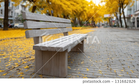 autumn park scene with a wooden bench 131682826