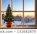 Condensed windows and a Christmas tree in winter 131682870