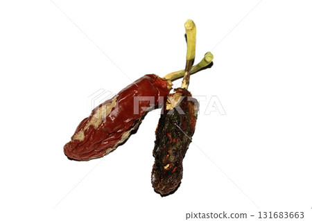 Rotten dried chilli or chili pepper jalapeno that has been eaten by insects food waste Rotten dried chilli or chili pepper jalapeno that has been eaten by insects food waste 131683663