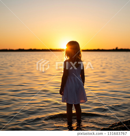 beautiful young woman standing on the beach 131683767