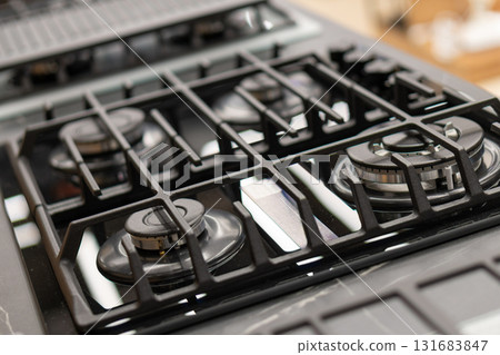 Close-up of modern gas stove burners 131683847