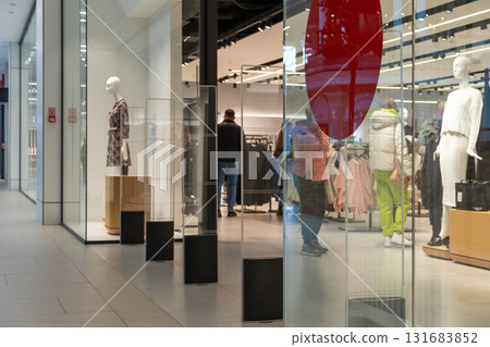 Radio-frequency security gates with integrated metal detector at a clothing store entrance 131683852