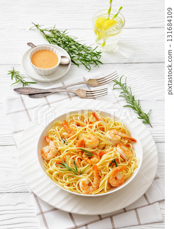 yummy spaghetti with shrimps in a white bowl 131684109