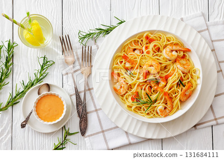 yummy spaghetti with shrimps in a white bowl 131684111