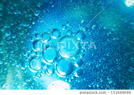 Oil bubbles close up. circles of water macro. abstract light blue background 131684699