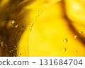 Gold Oil bubbles. circles of orange water macro. abstract yellow background 131684704