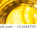 Gold Oil bubbles. circles of orange water macro. abstract yellow background 131684705
